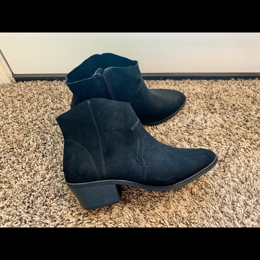 Women’s black ankle booties.